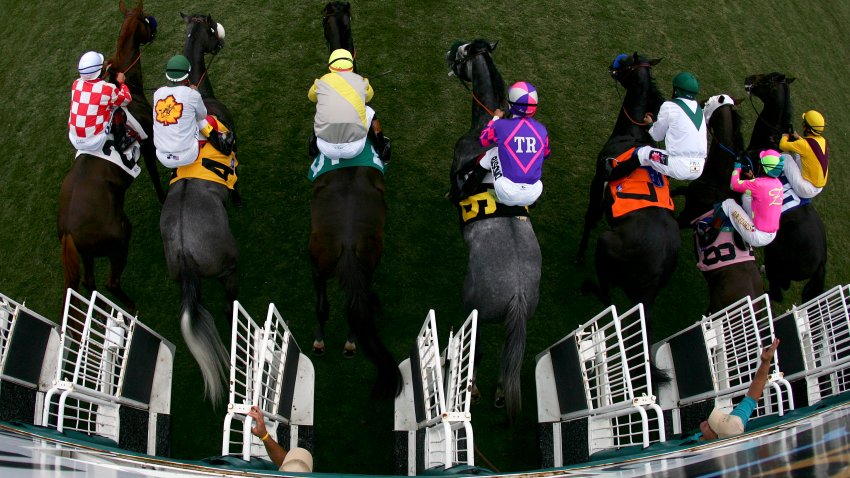 FILE Horses coming out of the gate at the Del Mar Racing track in 2019.