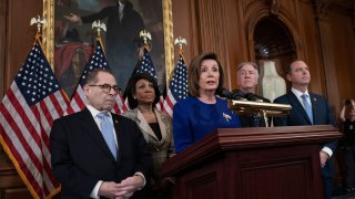 FILE PHOTO: Speaker of the House Nancy Pelosi, D-Calif., joined from left by House Judiciary Committee Chairman Jerrold Nadler, D-N.Y., House Financial Services Committee Chairwoman Maxine Waters, D-Calif., House Ways and Means Committee Chairman Richard Neal, D-Mass., and House Intelligence Committee Chairman Adam Schiff, D-Calif., announces they are pushing ahead with two articles of impeachment against President Donald Trump — abuse of power and obstruction of Congress — charging he corrupted the U.S. election process and endangered national security in his dealings with Ukraine, at the Capitol in Washington, Tuesday, Dec. 10, 2019. (AP Photo/J. Scott Applewhite)