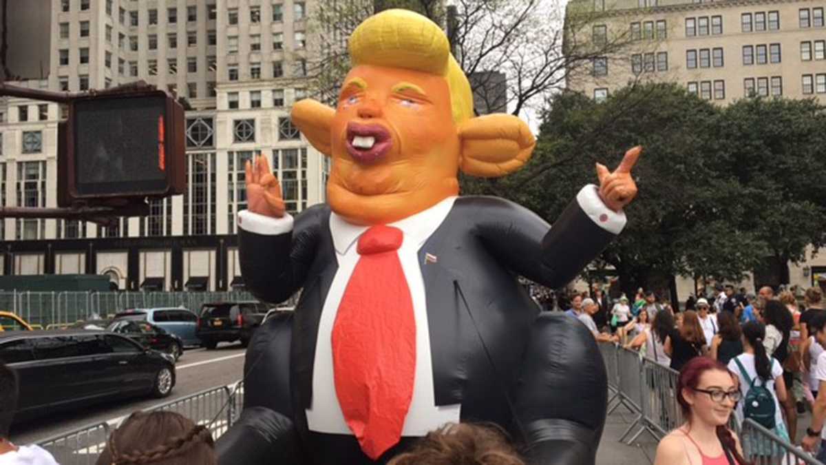 In Pictures Protesters March To Trump Tower Ahead Of Presidents 1st