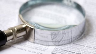 Magnifying glass solving crime generic