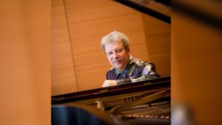 UCSD's Anthony Davis seated at piano