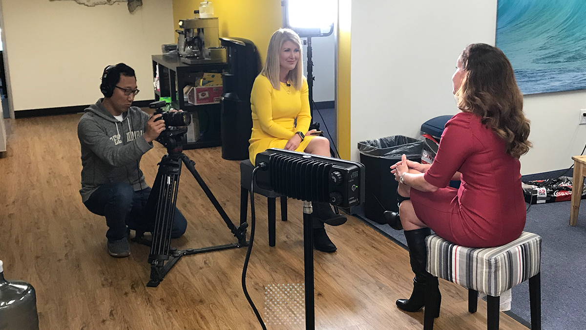 NBC 7 photojournalist Jay Yoo captures the conversation between Monica Dean and NFAR's Outreach Specialist, Chelsea Asaro.
