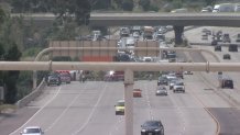 A semi truck overturned on I-15.