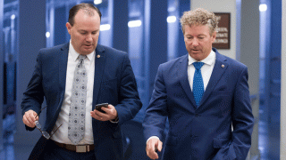 Sen. Mike Lee, R-Utah, and Sen. Rand Paul, R-Ky., walk to a vote on Capitol Hill, Thursday, June 27, 2019 in Washington.