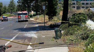 The mess left behind by a deadly car crash in Rancho Bernardo