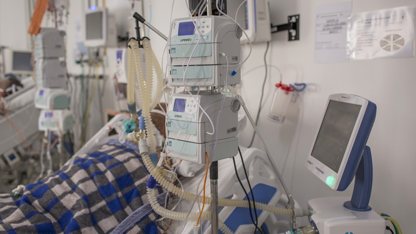 A patient on a respirator in the hospital.