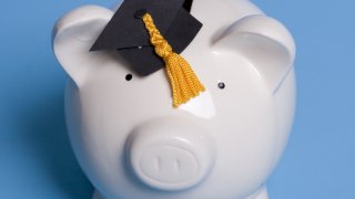generic college salary piggy bank graduation cap