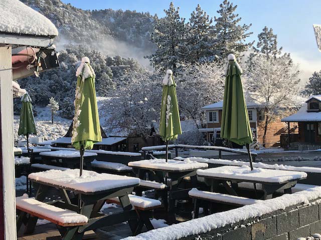 A couple of inches of snow layered tables in Wrightwood Nov. 21, 2019. 