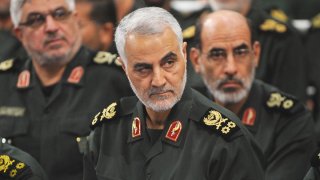 A file photo dated September 18, 2016, shows Iranian Revolutionary Guards' Quds Force commander Qasem Soleimani (C) during Iranian Supreme Leader Ayatollah Ali Khamenei's meeting with Revolutionary Guards, in Tehran, Iran. The U.S. carried out a strike that killed Soleimani and several other military leaders in January.