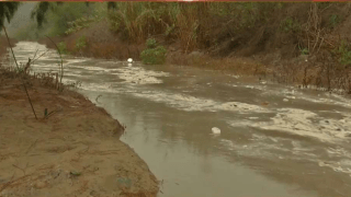 A photo of toxic runoff flowing in the Tijuana River Valley.