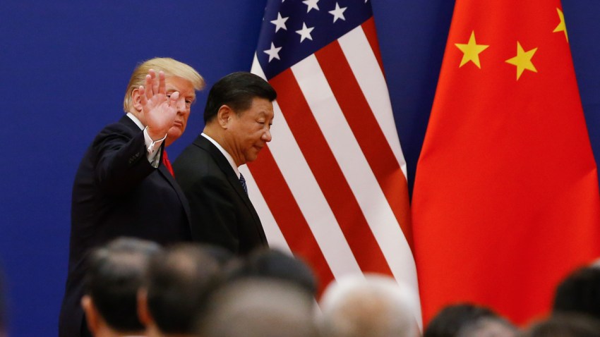 President Donald Trump and China's President Xi Jinping meet business leaders at the Great Hall of the People on Nov. 9, 2017, in Beijing, China.