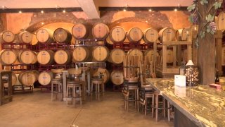 An image of wine barrels at a Ramona, California vineyard.