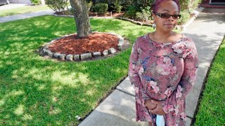 Parent and teacher Stacey Pugh poses for a photograph outside her home Monday, July 13, 2020, in Humble, Texas. While children have proven to be less susceptible to the coronavirus, teachers are vulnerable. “I will be wearing a mask, a face shield, possibly gloves, and I’m even considering getting some type of body covering to wear,” says Pugh, a fifth-grade teacher in suburban Houston.