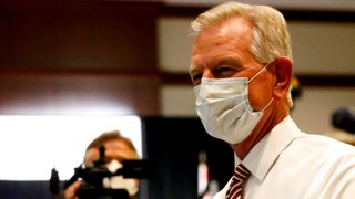 Former Auburn coach, Tommy Tuberville, talks with supporters as they gather at the Renaissance hotel for a watch party in the runoff election between Senator Jeff Sessions and Tommy Tuberville on Tuesday, July 14, in Montgomery, Ala.