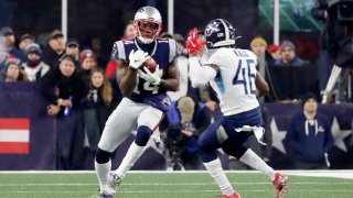 FOXBOROUGH, MA - JANUARY 04: New England Patriots wide receiver Mohamed Sanu Sr. (14) fields a punt during an AFC Wild Card game between the New England Patriots and the Tennessee Titans on January 4, 2020, at Gillette Stadium in Foxborough, Massachusetts.