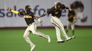SAN FRANCISCO, CALIFORNIA – JULY 28: Jurickson Profar (left) #10 talks to Fernando Tatis Jr. #23 of the San Diego Padres celebrate after they beat the San Francisco Giants at Oracle Park on July 28, 2020 in San Francisco, California. (Photo by Ezra Shaw/Getty Images)