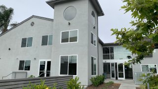 An exterior view of a newly renovated transitional housing for homeless families and individuals.