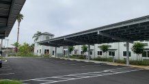 Another exterior look of the new transitional shelter and its parking lot.