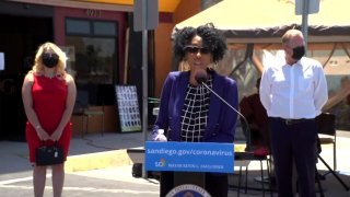 San Diego City Councilwoman Monica Montgomery (at podium)