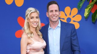 In this Sept. 5, 2019, file photo, Tarek El Moussa and Heather Rae Young attend the premiere of HGTV's "A Very Brady Renovation" at The Garland Hotel in North Hollywood, California.