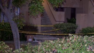 an apartment surrounded by caution tape