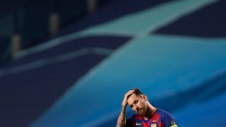 Barcelona's Lionel Messi react during the Champions League quarterfinal match between FC Barcelona and Bayern Munich at the Luz stadium in Lisbon, Portugal, Friday, Aug. 14, 2020.
