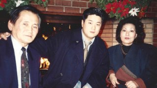 In this undated photo provided by Charlton Rhee, Rhee, a nursing home administrator from New York, poses for a photo with his parents, Man Joon Rhee and Eulja Rhee. Charlton Rhee, whose parents came to the U.S. from South Korea, lost both of them to COVID-19 as the virus surged in New York City. A joint analysis by The Associated Press and The Marshall Project found that Asian Americans join Black and Hispanic Americans among the hardest-hit groups, with deaths in each group up at least 30% this year.