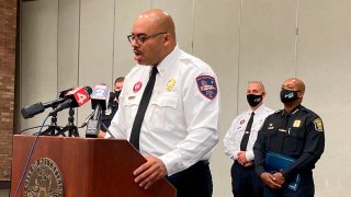 Southfield, Mich., Fire Chief Johnny Menifee holds a news conference on Wednesday, Aug. 26, 2020, in Southfield, Mich., in response to questions about a woman, Timesha Beauchamp, who was found alive at a funeral home.