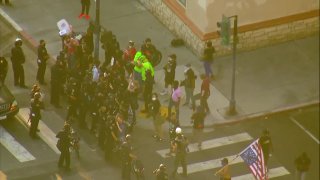 Protesters for racial justice and San Diego police in downtown San Diego.