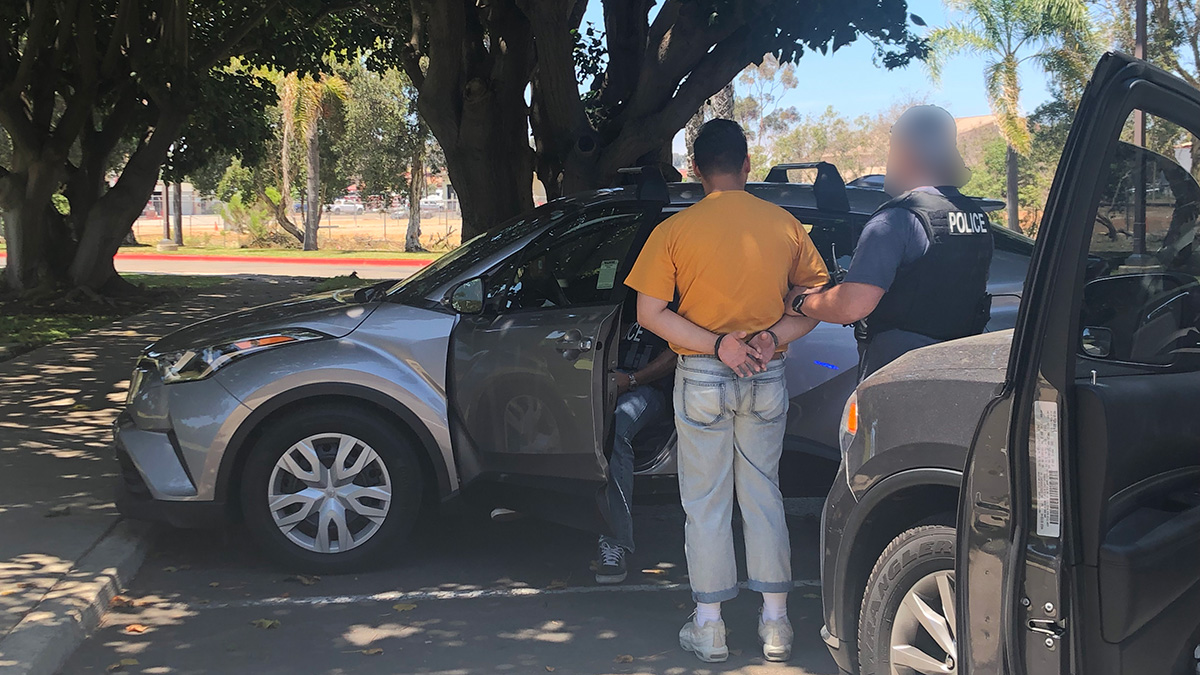 A suspected sex buyer is handcuffed by undercover Human Trafficking Task Force agents after showing up to meet who he though was a teenage boy to exchange money for sex acts. The man was uncuffed a short time later after he was charged with only a misdemeanor and fined around $200.