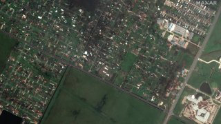 satellite imagery of a destroyed neighborhood near Lake Charles Memorial Hospital