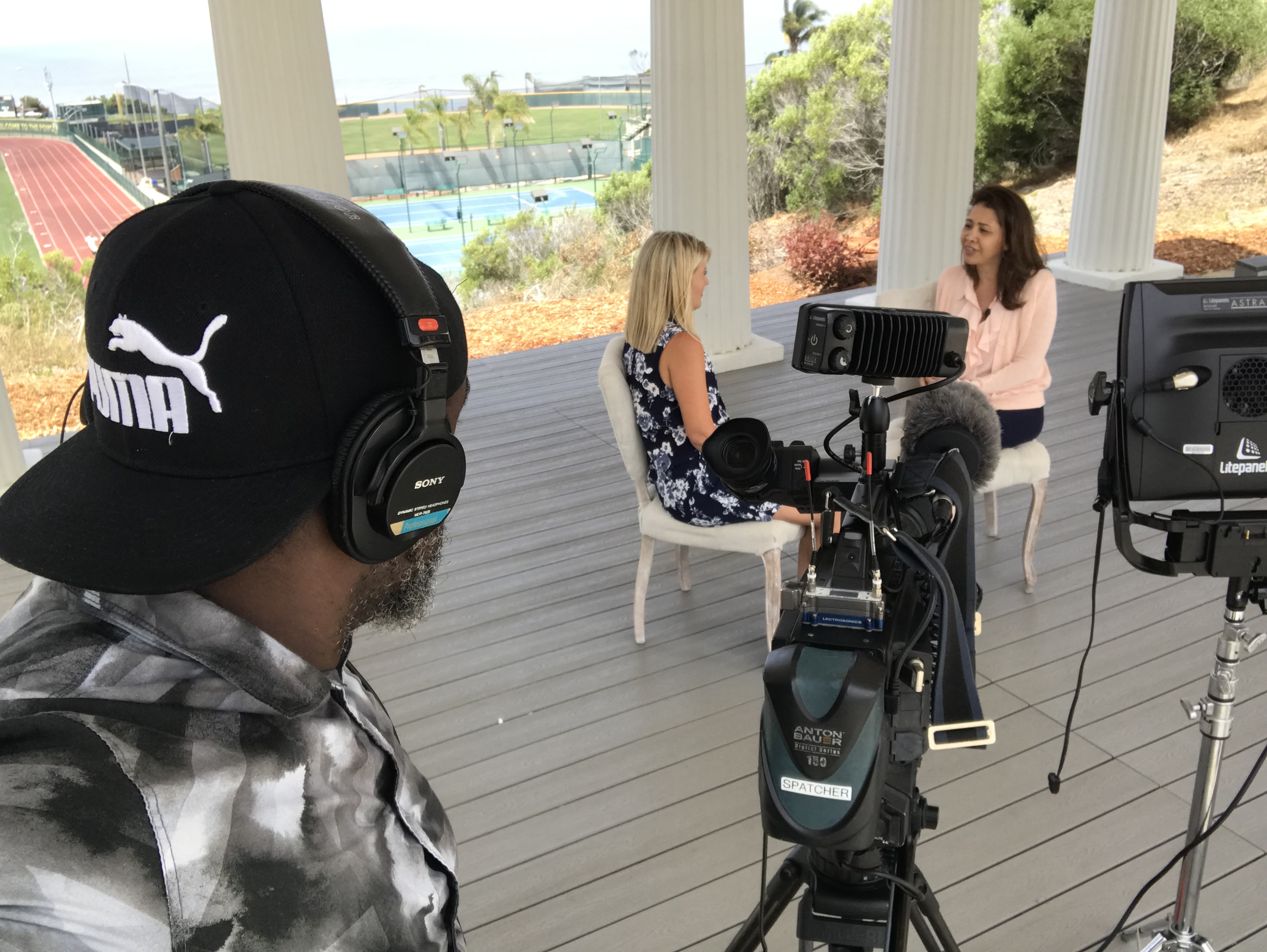 NBC 7 photojournalist Elroy Spatcher gets the shot as Monica Dean interviews survivor/advocate Jessica Kim.