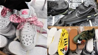 CBP officers seize hundreds of counterfeit shoes.