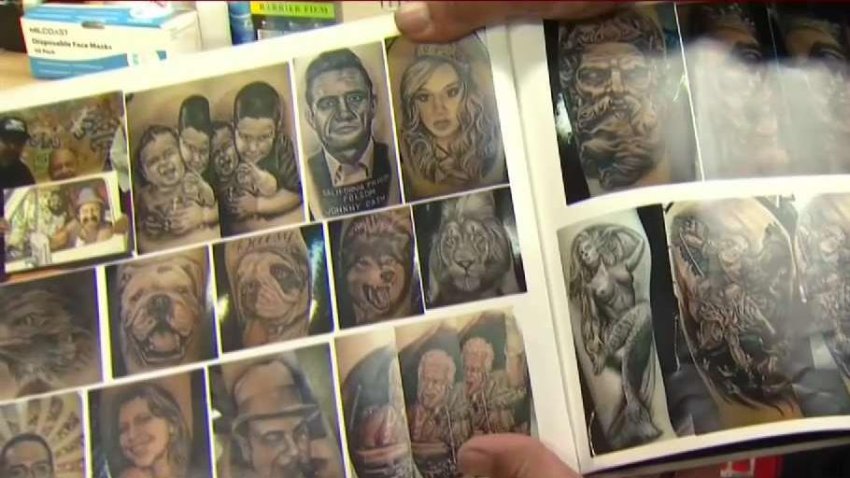 Owner of Tattoo Parlor Celebrates Reopening Day