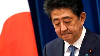 Japanese Prime Minister Shinzo Abe speaks during a press conference at the prime minister official residence in Tokyo Friday, Aug. 28, 2020. Abe, Japan’s longest-serving prime minister, says he’s resigning because a chronic illness has resurfaced.
