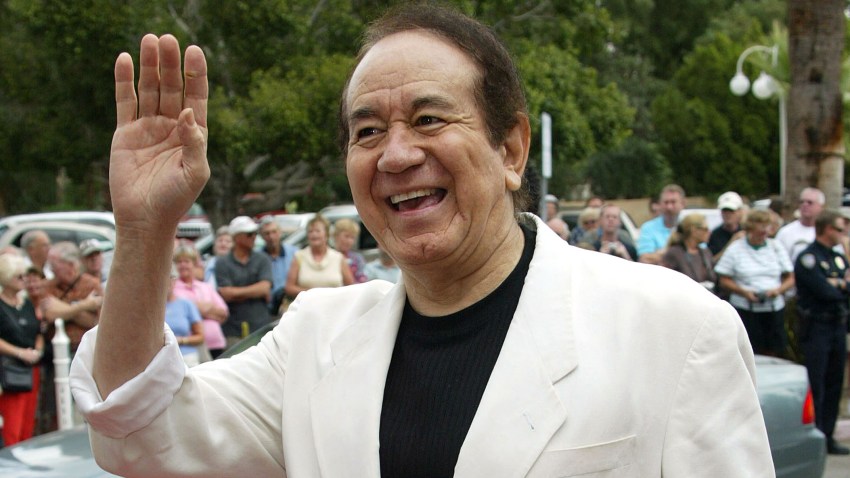 In this Oct. 17, 2004, file photo, recording artist Trini Lopez attends the Palm Springs International Film Society and its Film Festival honoring actor Kirk Douglas at the Annenberg Theatre in the Palm Springs Desert Museum in Palm Springs, California.