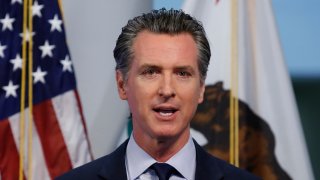 Gavin Newsom, governor of California, speaks during a news conference in Sacramento, California, U.S., on Tuesday, April 14, 2020. Newsom outlined his plan to lift restrictions in the most-populous U.S. state, saying a reopening depends on meeting a series of benchmarks that would remake daily life for 40 million residents. Photographer: Rich Pedroncelli/AP/Bloomberg via Getty Images