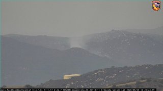 An SDG&E Wildfire Cam captures smoke from a fire in the De Luz Area