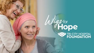A banner for Wigs for Hope.