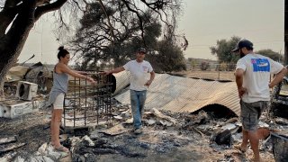 Blake Campos and Alexandra Hultman are left with nearly nothing after the Valley Fire ripped through their Jamul home.