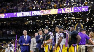 ESPN's Rece Davis interviews Quarterback Joe Burrow #9 of the LSU Tigers on stage after the College Football Playoff National Championship game against the Clemson Tigers at the Mercedes-Benz Superdome on January 13, 2020 in New Orleans, Louisiana. LSU defeated Clemson 42 to 25.