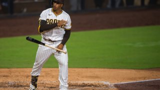 SAN DIEGO, CA – SEPTEMBER 14: Trent Grisham #2 of the San Diego Padres tosses his bat after hitting a home run in the bottom of the sixth inning against the Los Angeles Dodgers at PETCO Park on September 14, 2020 in San Diego, California. (Photo by Matt Thomas/San Diego Padres/Getty Images)