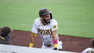 SAN DIEGO, CA – AUGUST 22: Fernando Tatis Jr. #23 of the San Diego Padres waits by the dugout during the second inning of a baseball game against Houston Astros at Petco Park on August 22, 2020 in San Diego, California. (Photo by Denis Poroy/Getty Images)