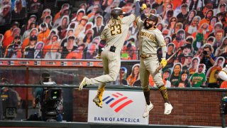 SAN FRANCISCO, CA – SEPTEMBER 25: San Diego Padres shortstop Fernando Tatis (23) celebrates his home run with San Diego Padres first baseman Eric Hosmer (30) during a MLB game between the San Diego Padres and the San Francisco Giants on September 26, 2020 at Oracle Park in San Francisco, CA. The 2020 regular season has been shortened to 60 games due to the COVID-19 Pandemic. (Photo by Brian Rothmuller/Icon Sportswire via Getty Images)