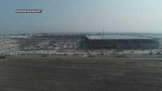 An aerial shot of a large building under construction