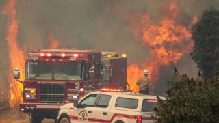 Lakeside firefighters fight Valley Fire.