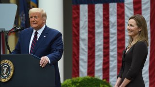 US President Donald Trump announces his US Supreme Court nominee, Judge Amy Coney Barrett (R), in the Rose Garden of the White House in Washington, DC on September 26, 2020. - Barrett, if confirmed by the US Senate, will replace Justice Ruth Bader Ginsburg, who died on September 18.