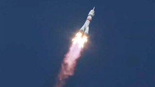 In this image made from video footage released by Roscosmos Space Agency, the Soyuz-2.1a rocket booster with the Soyuz MS-17 space ship carrying a new crew to the International Space Station (ISS), blasts off at the Russian leased Baikonur cosmodrome, Kazakhstan, Wednesday, Oct. 14, 2020. A trio of space travelers has launched successfully to the International Spce Station, for the first time using a fast-track maneuver to reach the orbiting outpost in just three hours.