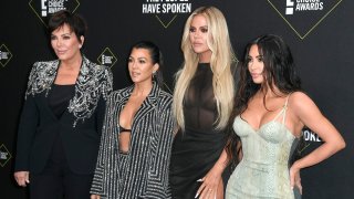 In this Nov. 10, 2019, file photo, (Left to right) Kris Jenner, Kourtney Kardashian, Khloe Kardashian, and Kim Kardashian West attend the 2019 E! People's Choice Awards at Barker Hangar in Santa Monica, California.