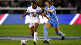 Catarina Macario #20 of the Stanford Cardinal and Morgan Goff #14 of the North Carolina Tar Heels battle for the ball during the Division I Women's Soccer Championship held at Avaya Stadium on December 8, 2019 in San Jose, California.